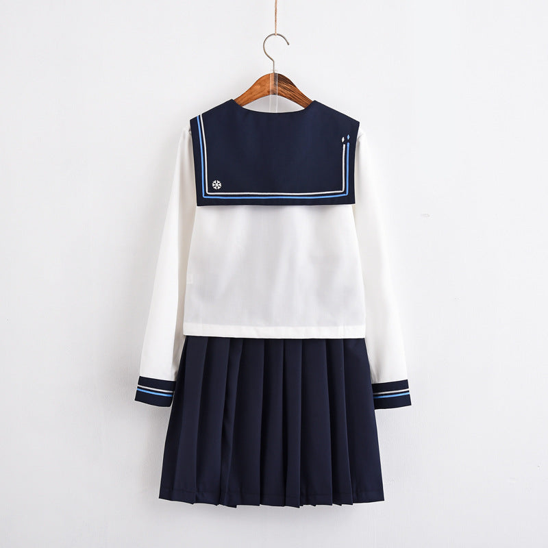 Weicher Schwester-JK-Uniform-Anzug im Marineblau-Wind-Matrosen-College-Stil mit Schneeflockenstickerei 